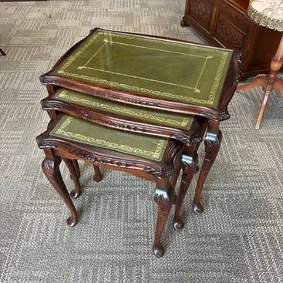 Beautiful mahogany green leather glass top nest of