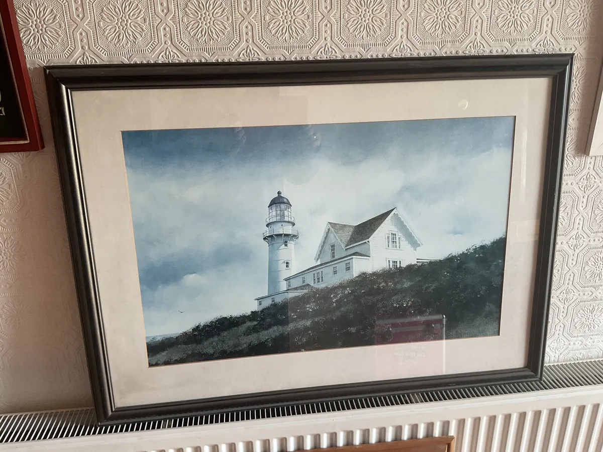 A framed print - Image 1