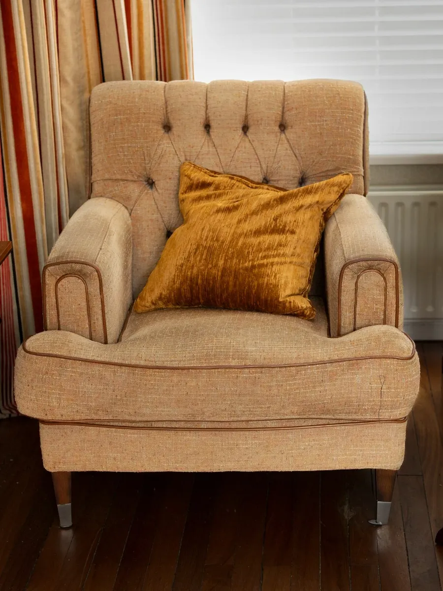 TWO ORIOR DESIGNED ARMCHAIRS