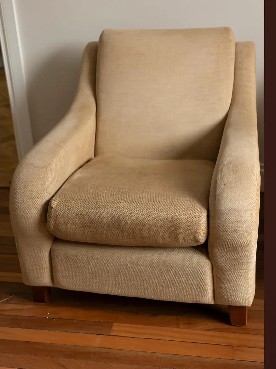 TWO DESIGNER ARMCHAIRS