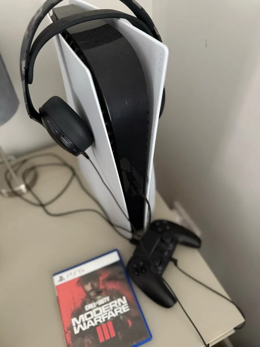 PlayStation 5, controller, headset and 2 games