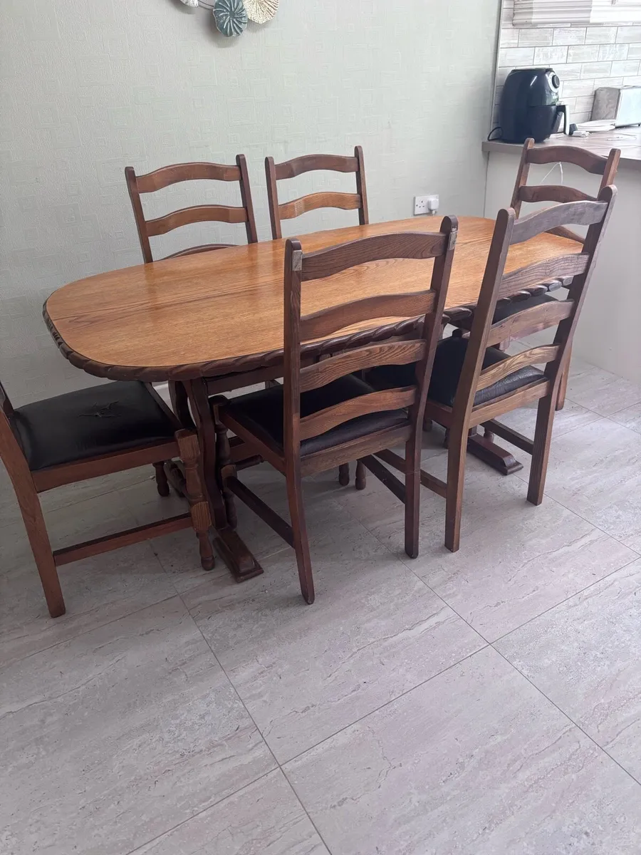 Solid wood table and six chairs - Image 1