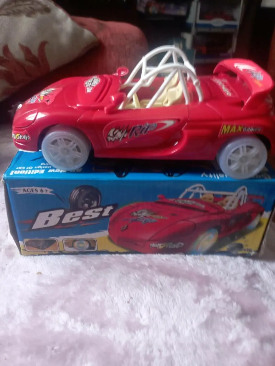 MUSICAL  LIGHT UP TOY CAR FOR AGES 6 +. - Image 2