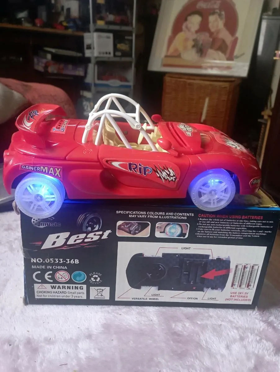 MUSICAL  LIGHT UP TOY CAR FOR AGES 6 +. - Image 1