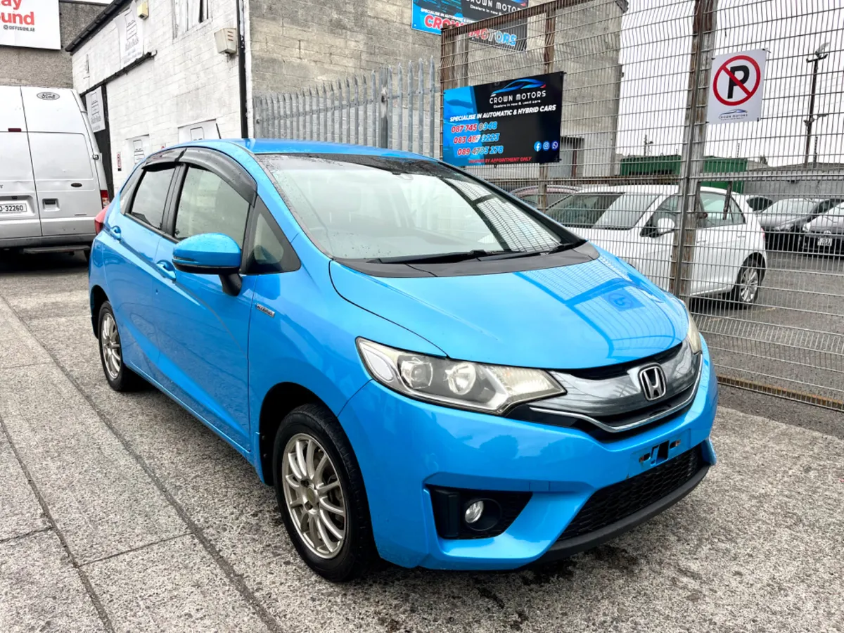 Honda fit 2014 hybrid  half leather interior - Image 3