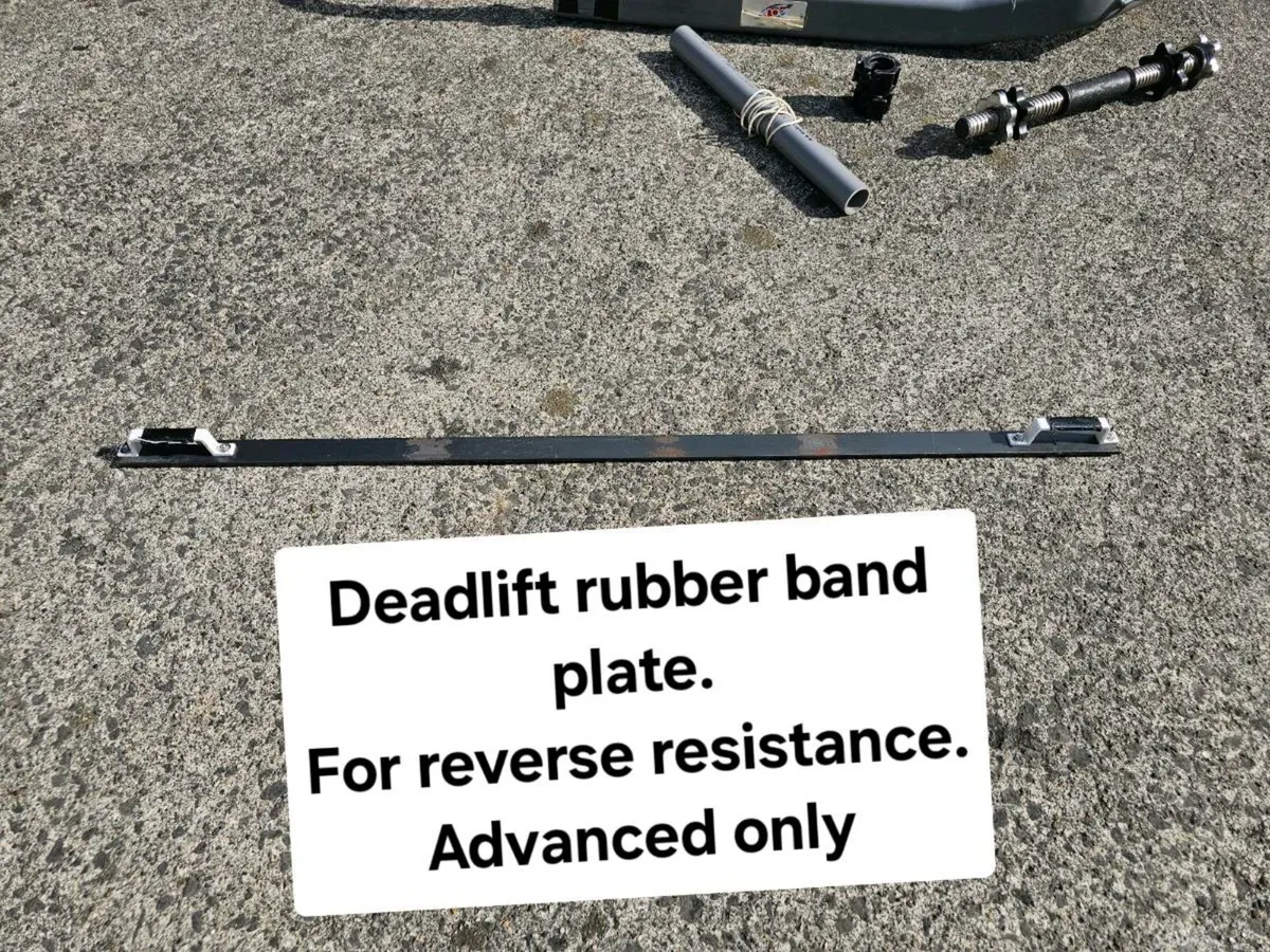 Strength training bar and plates - Image 1