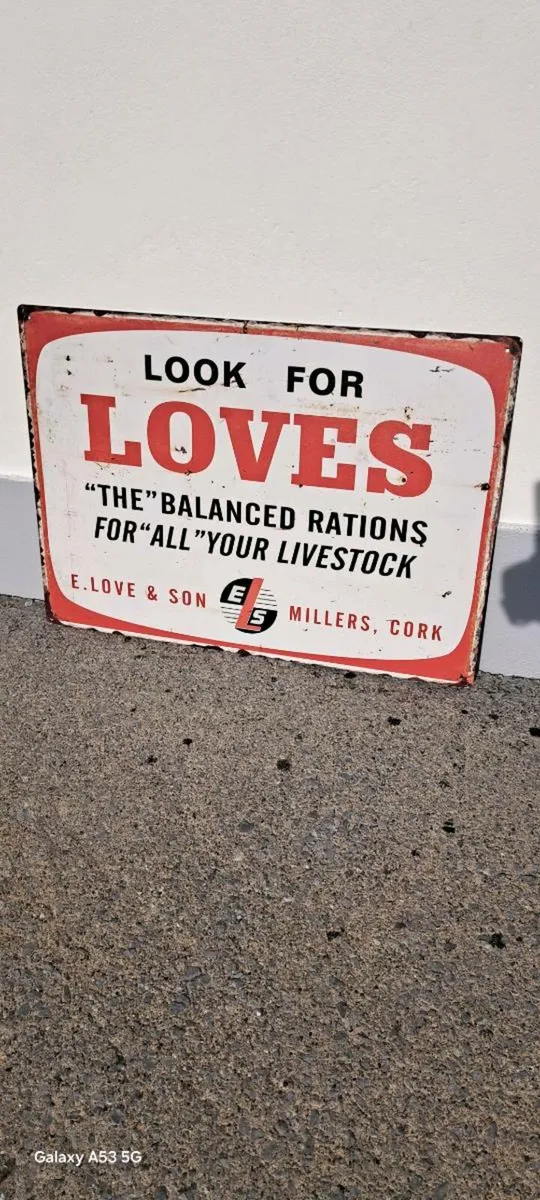 Large  Loves live stock metal sign