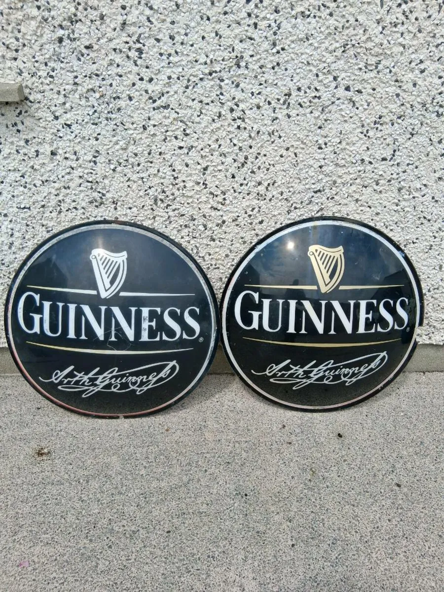 2 Guinness signs