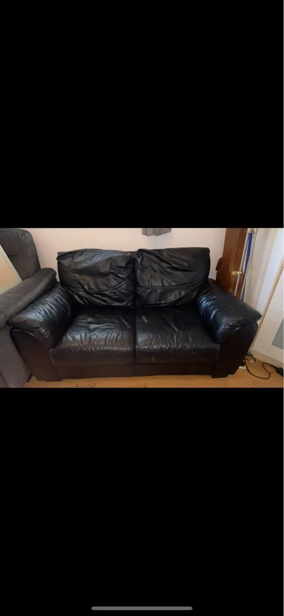Double seater leather couch