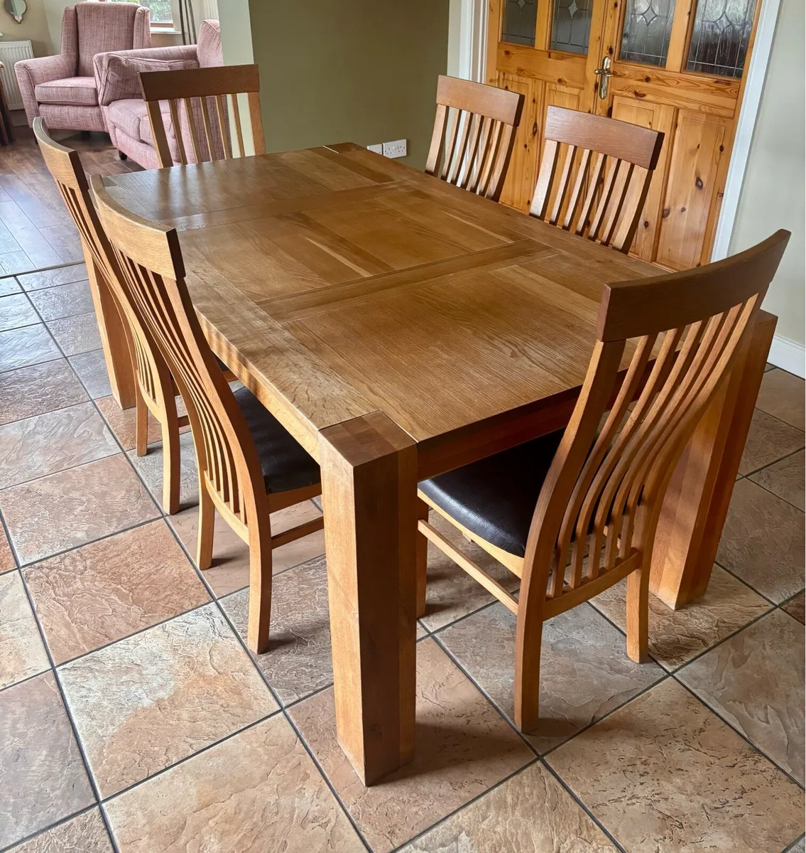 Solid Oak dinning room table and chairs - Image 1
