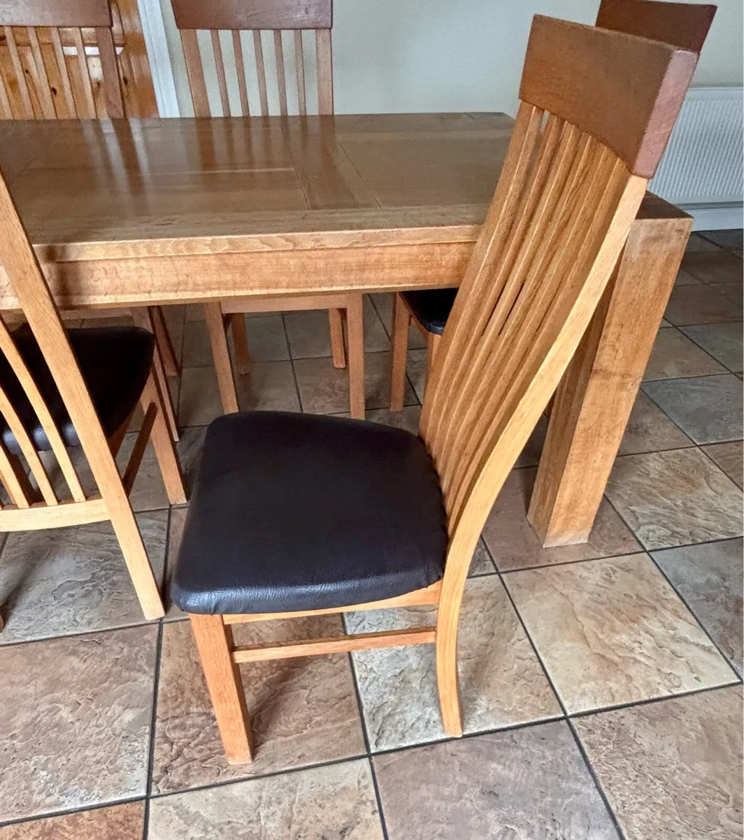 Solid Oak dinning room table and chairs - Image 4