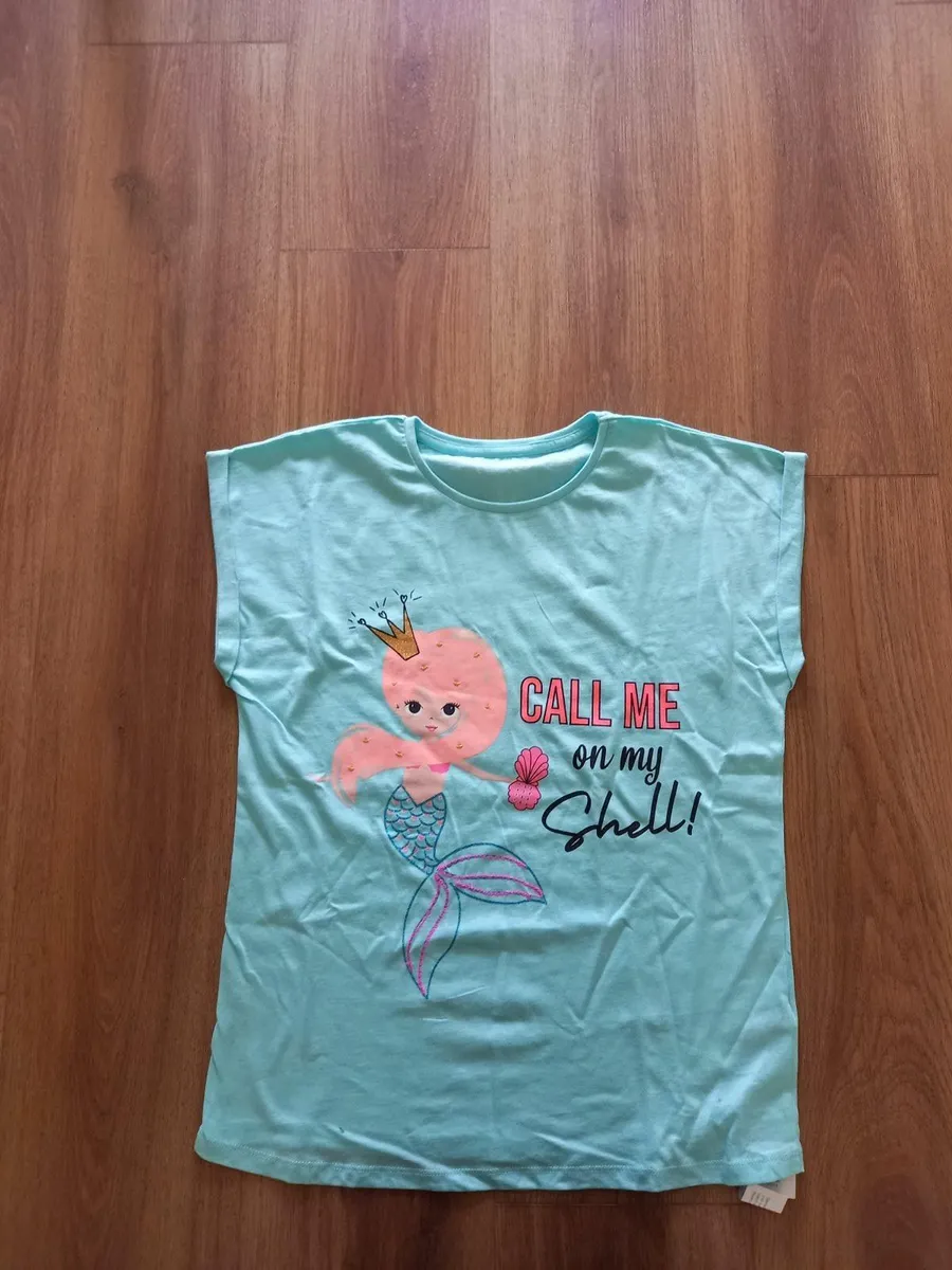 Girl's Blue Printed T shirt from Dunnes, Age 13 - Image 1