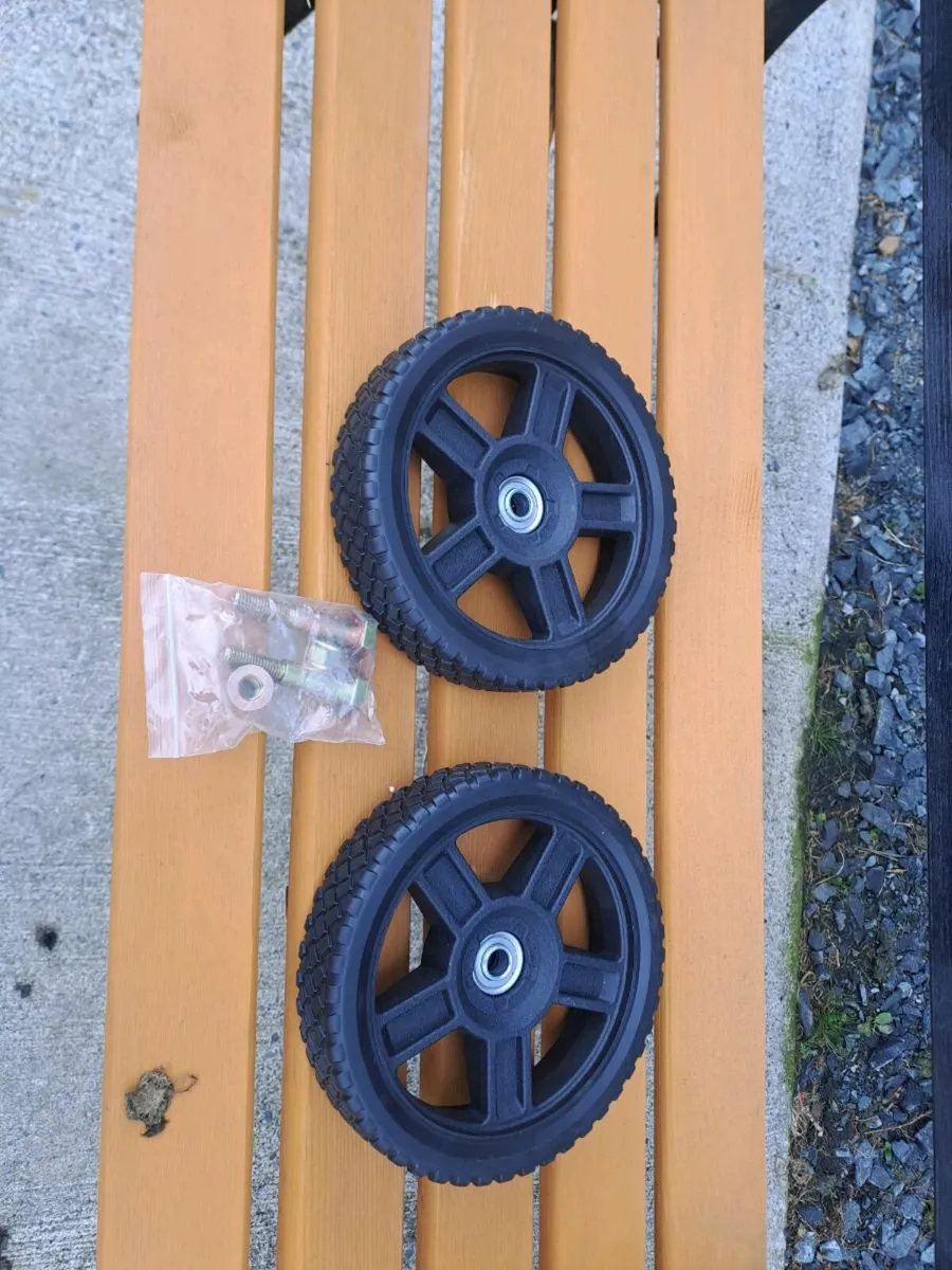 lawnmower wheels v.g.c