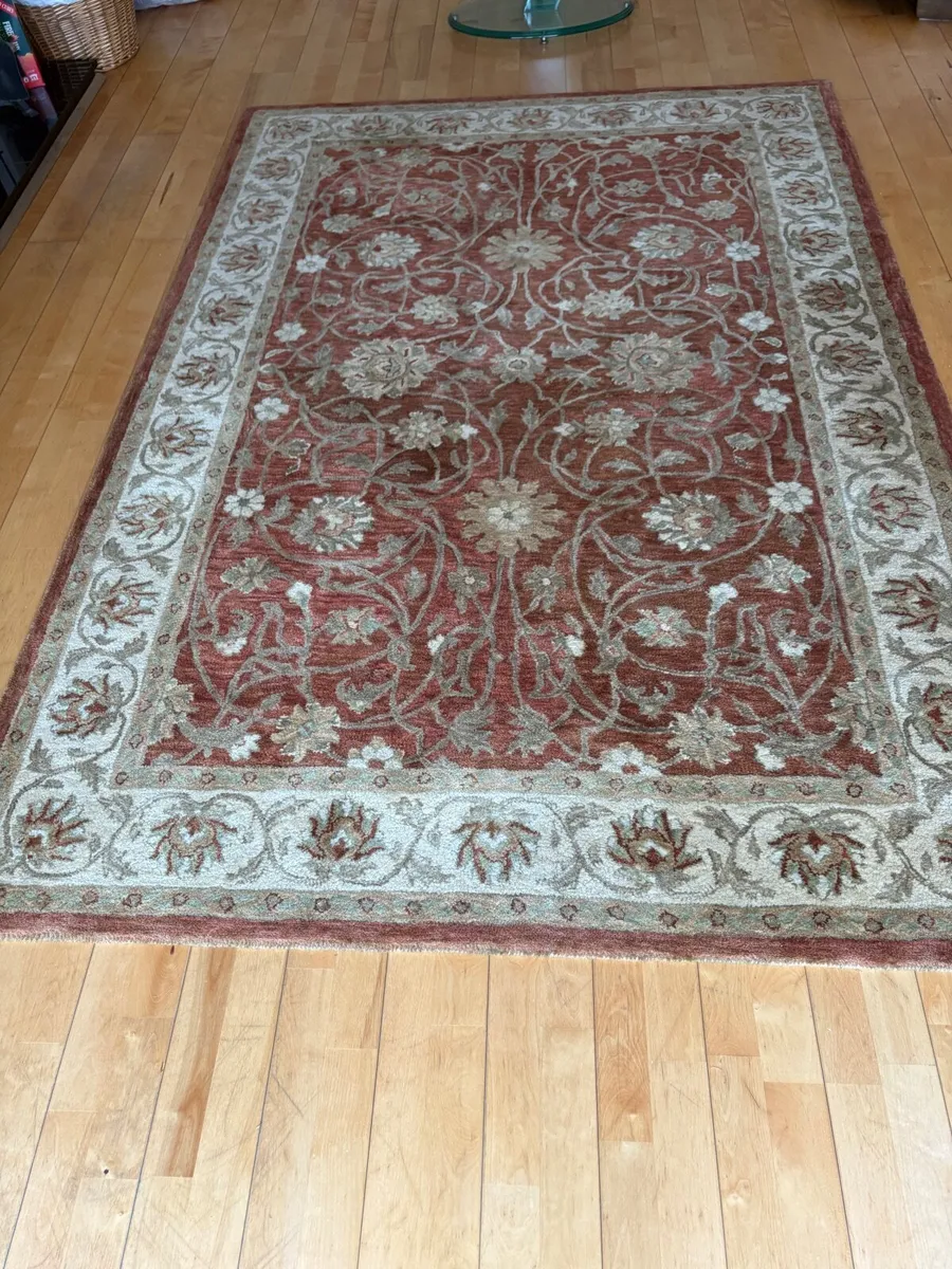 Rust and gold rug