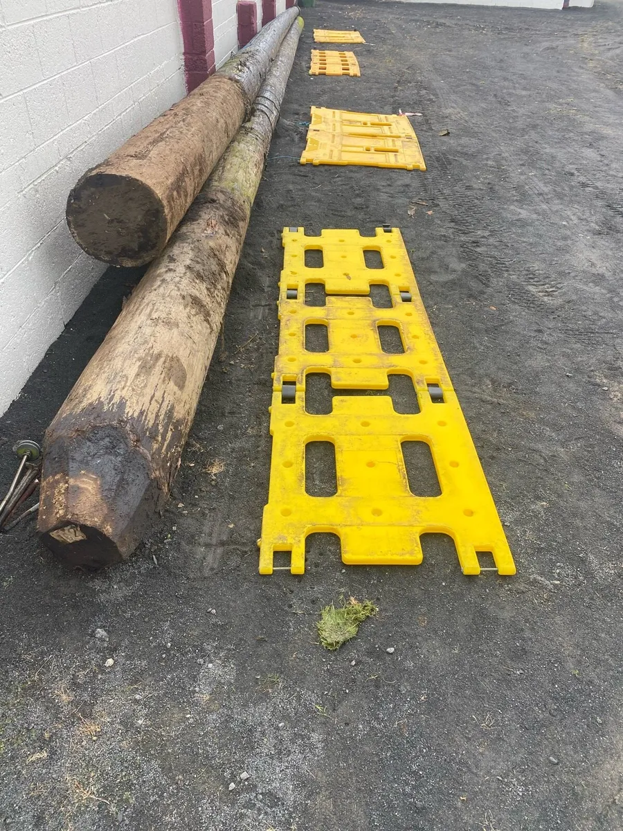 Steel and timber poles - Image 1