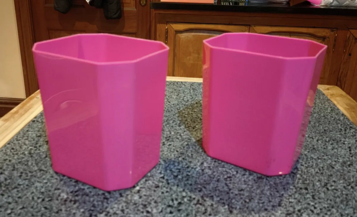 TWO PLASTIC PINK CONTAINERS (USED). - Image 1