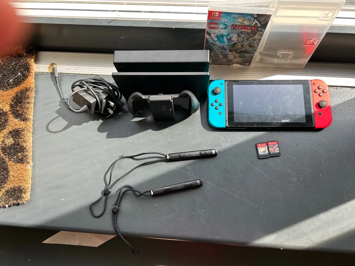 Nintendo switch with games - Image 1