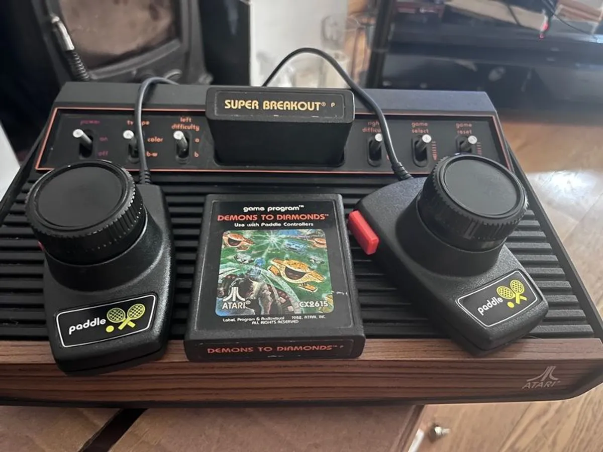 Original Atari 2600 cx with 17 Games and controllers - Image 1