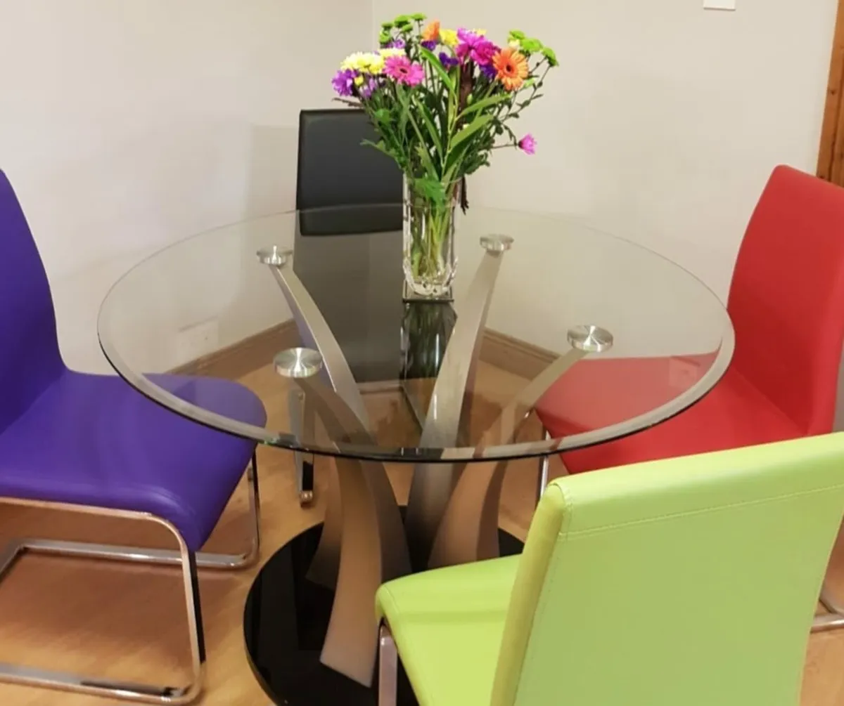 Glass top table with 4 chairs