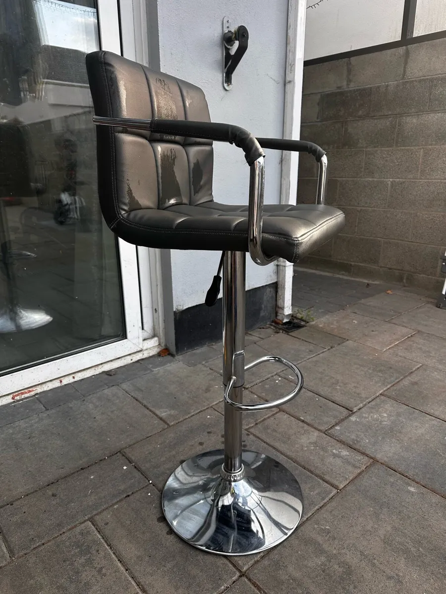 Adjustable and Swiveling Bar Stool - Image 1