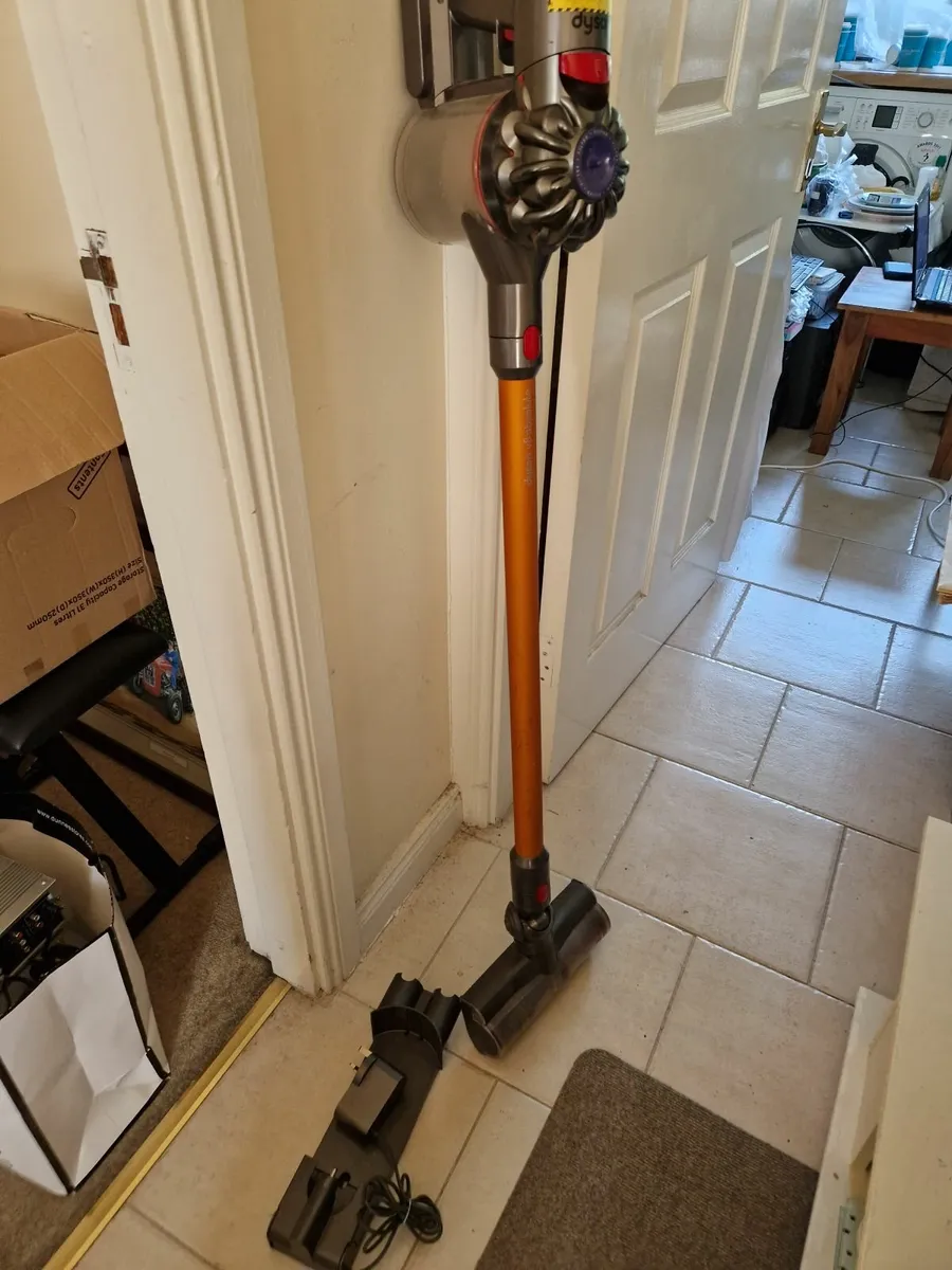 Dyson V8 Absolute Vertical Hoover with charger - Image 1