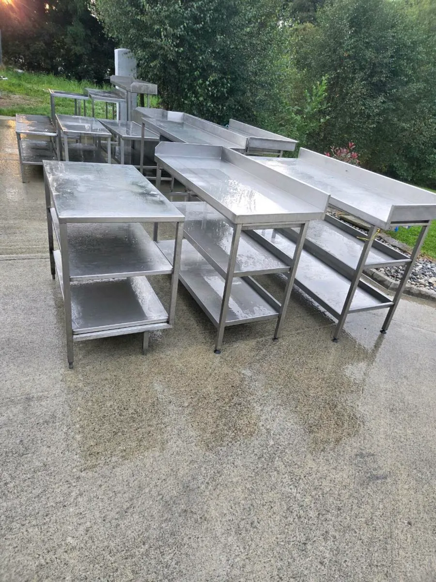 Large selection of stainless steel tables and sink - Image 1