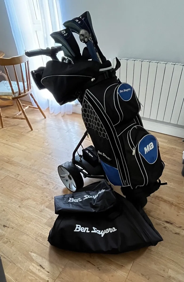 Golf clubs and cart - Image 1