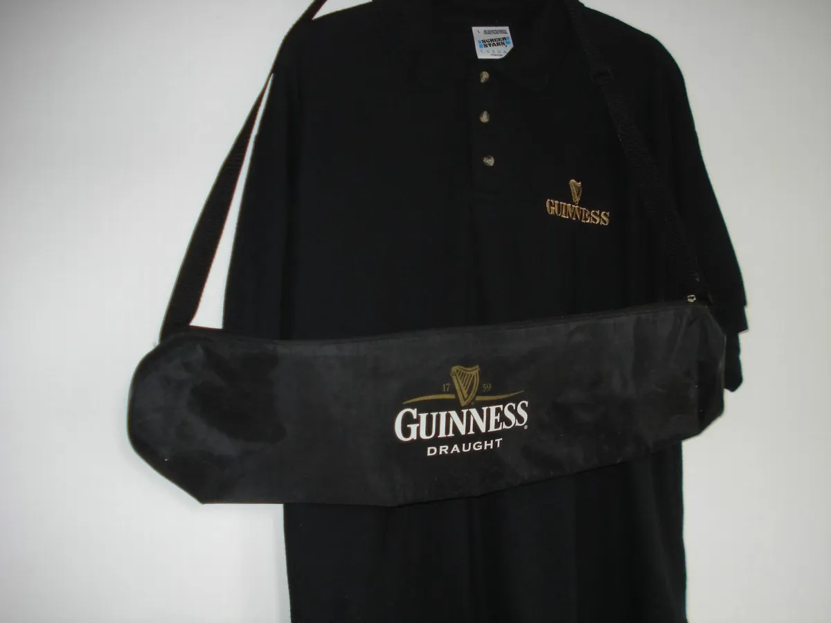GUINNESS  LARGE BLACK POLO T-SHIRT & CAN COOL BAG. - Image 1