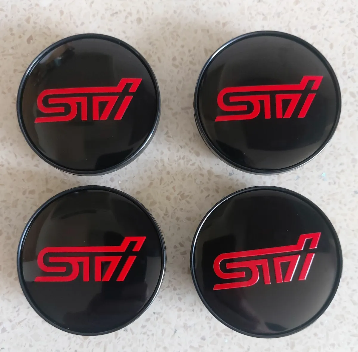 Suaru STI Centre Caps (59mm) FREE POST - Image 1