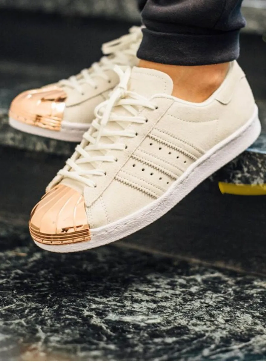 Rose gold toe Adidas superstars