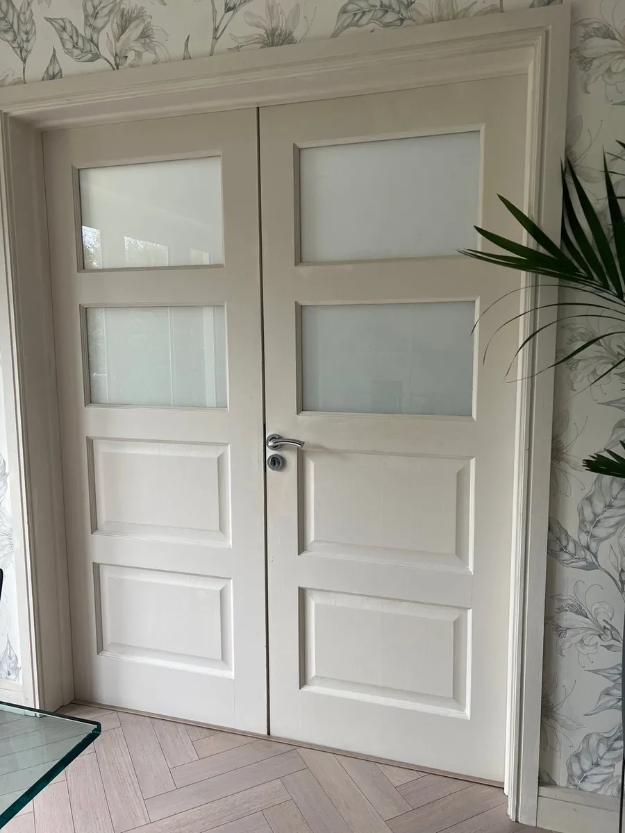 Two sets of painted double doors. - Image 1