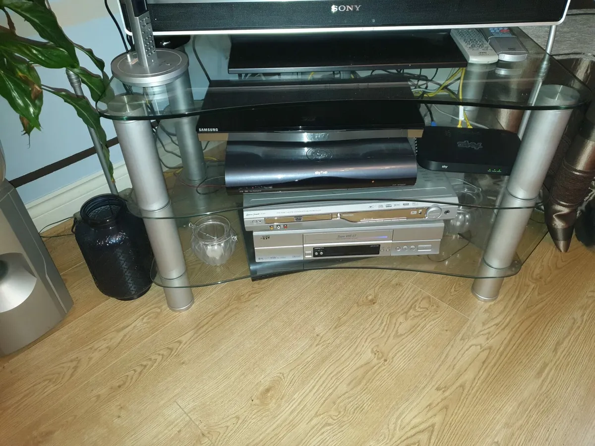 Glass and silver TV stand