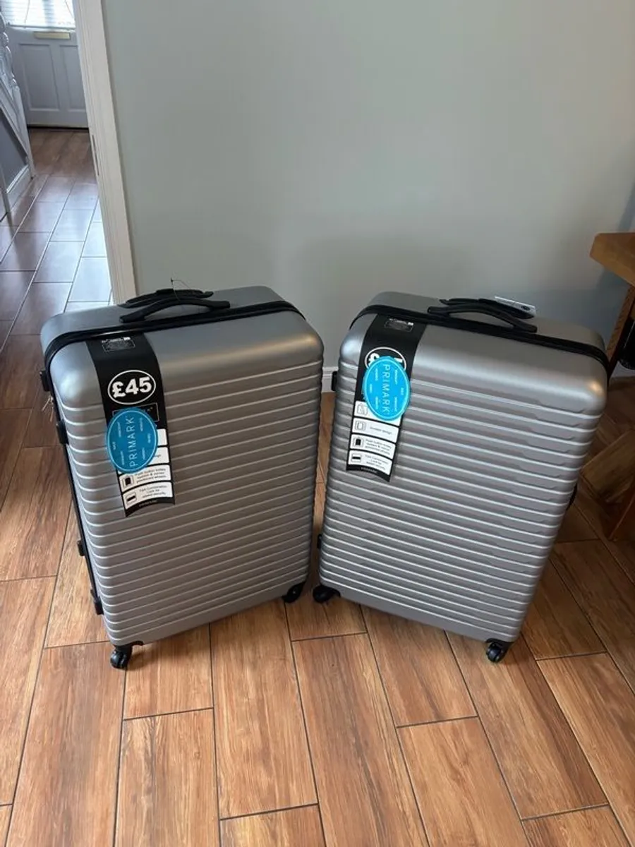 Two grey suitcase (new) - Image 1