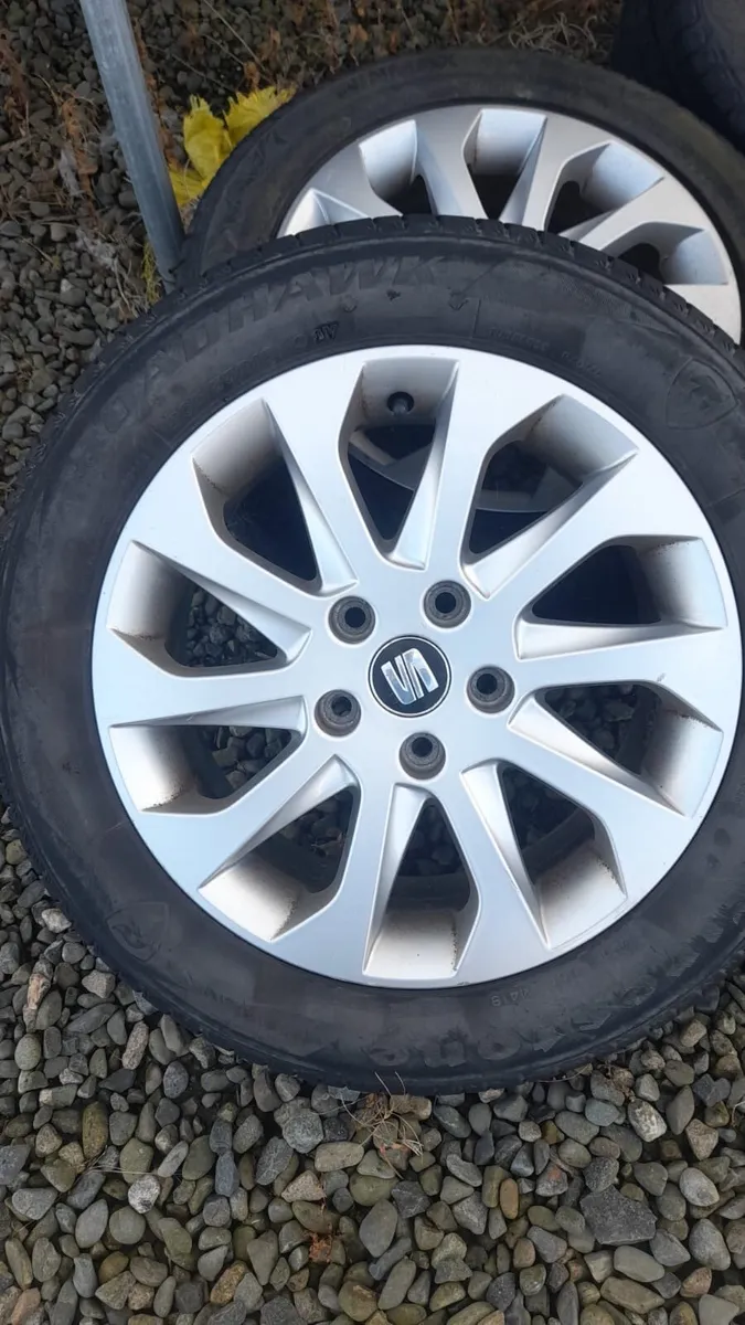 Set of Seat Alloys €120 Tyres in decent condition - Image 1