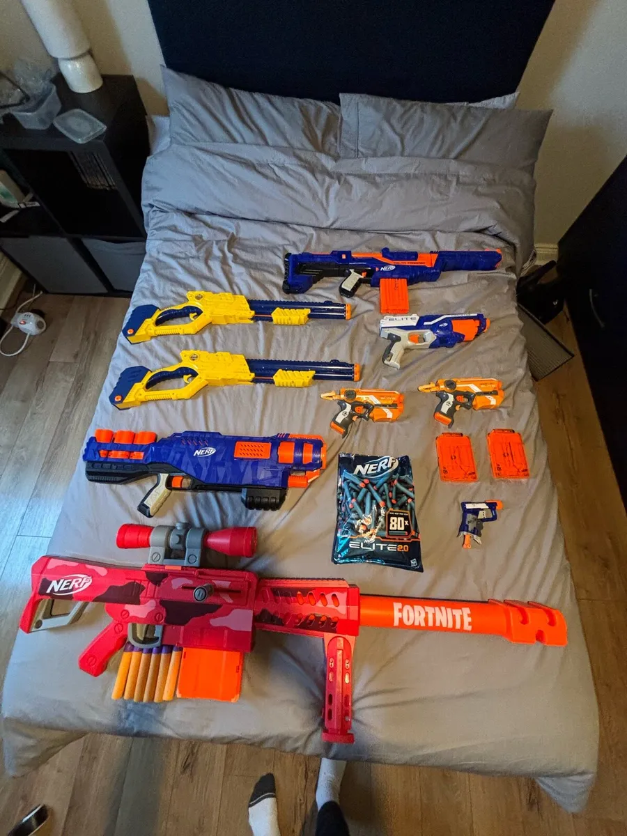 Nerf Guns 9, Nerf Bullets, & Vest - Image 1