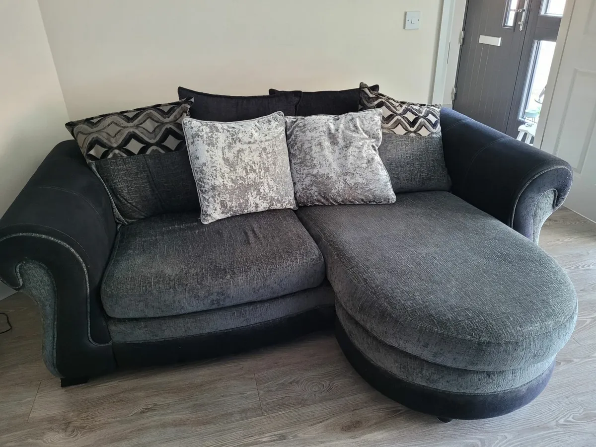 Two piece suite (Three seater sofa and circula - Image 1
