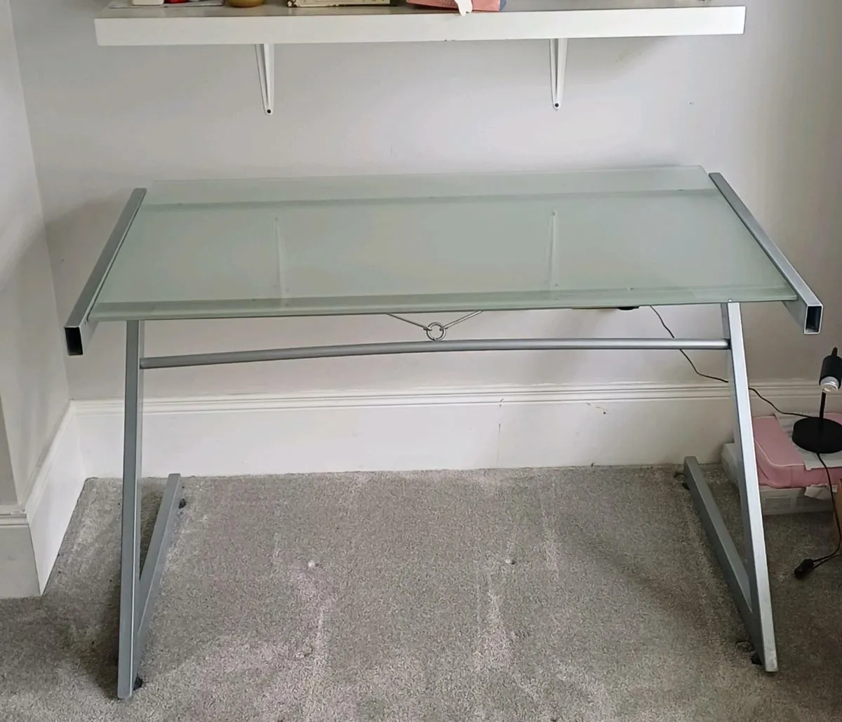 Glass-topped desk