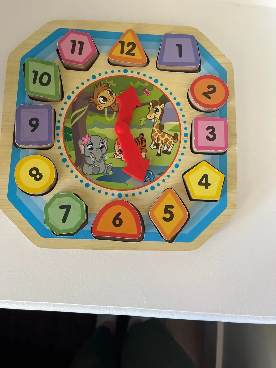 Wooden clock puzzle