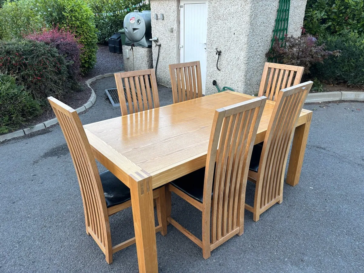 Solid oak table and 6 chairs