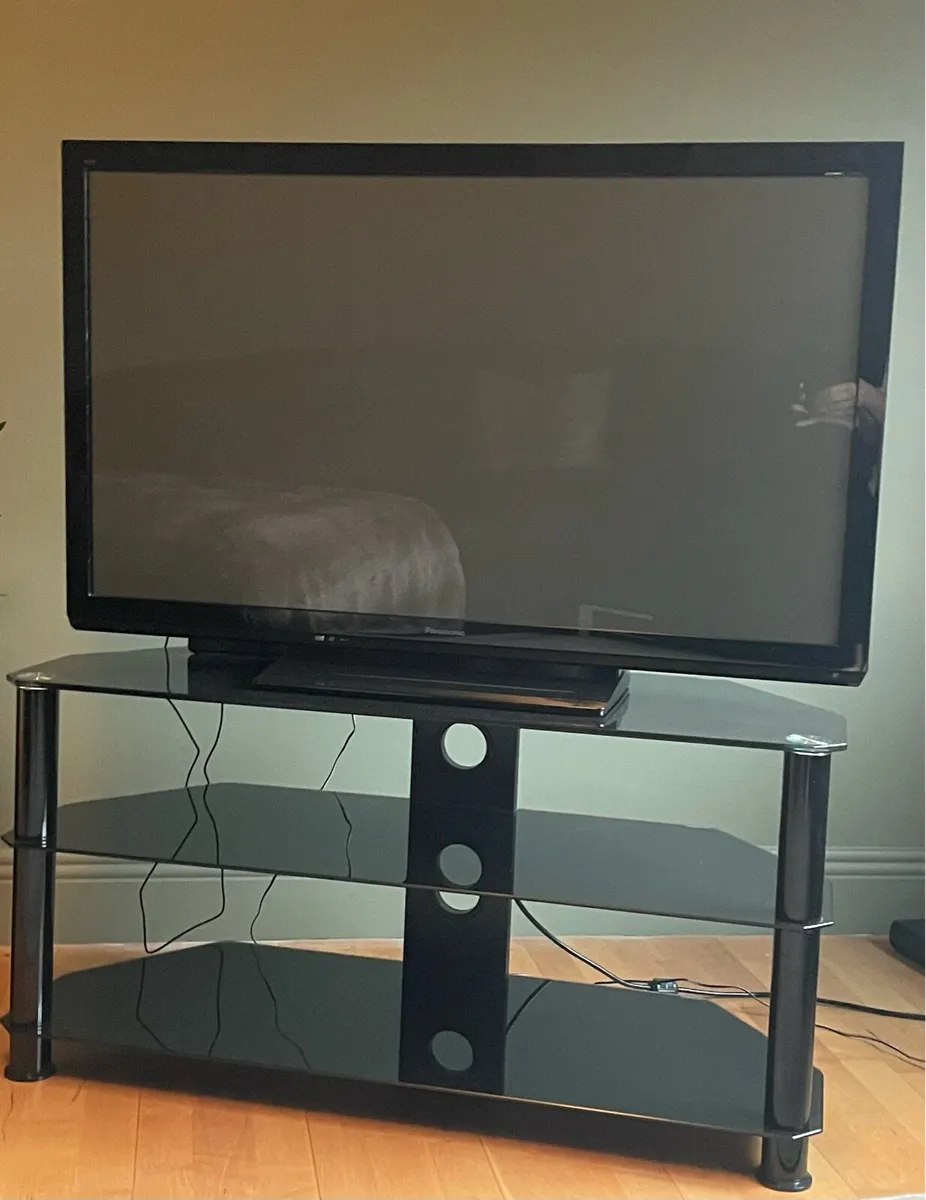 TV and TV Stand - Image 1