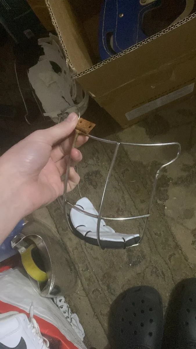 Rusted hinge hurling helmet guard - Image 2