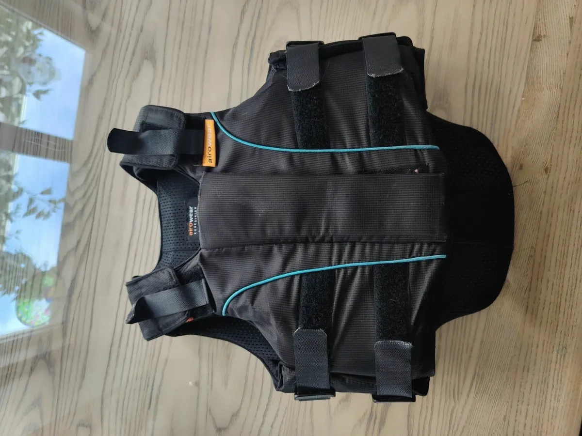 Back protectors and riding boots - Image 1