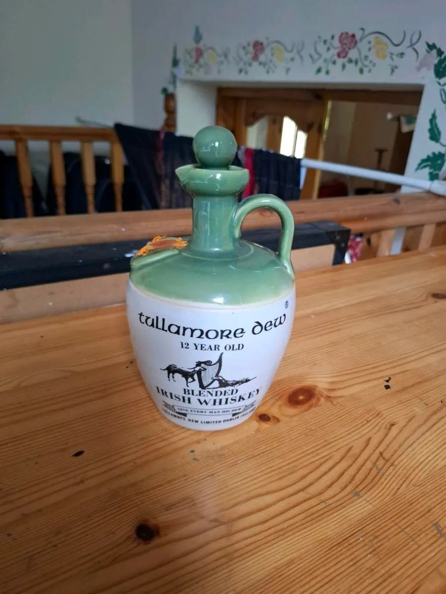 Tullamore dew whiskey bottle postage possible