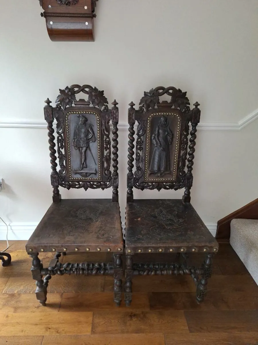Antique, hand crafted leather and wood chairs (2)