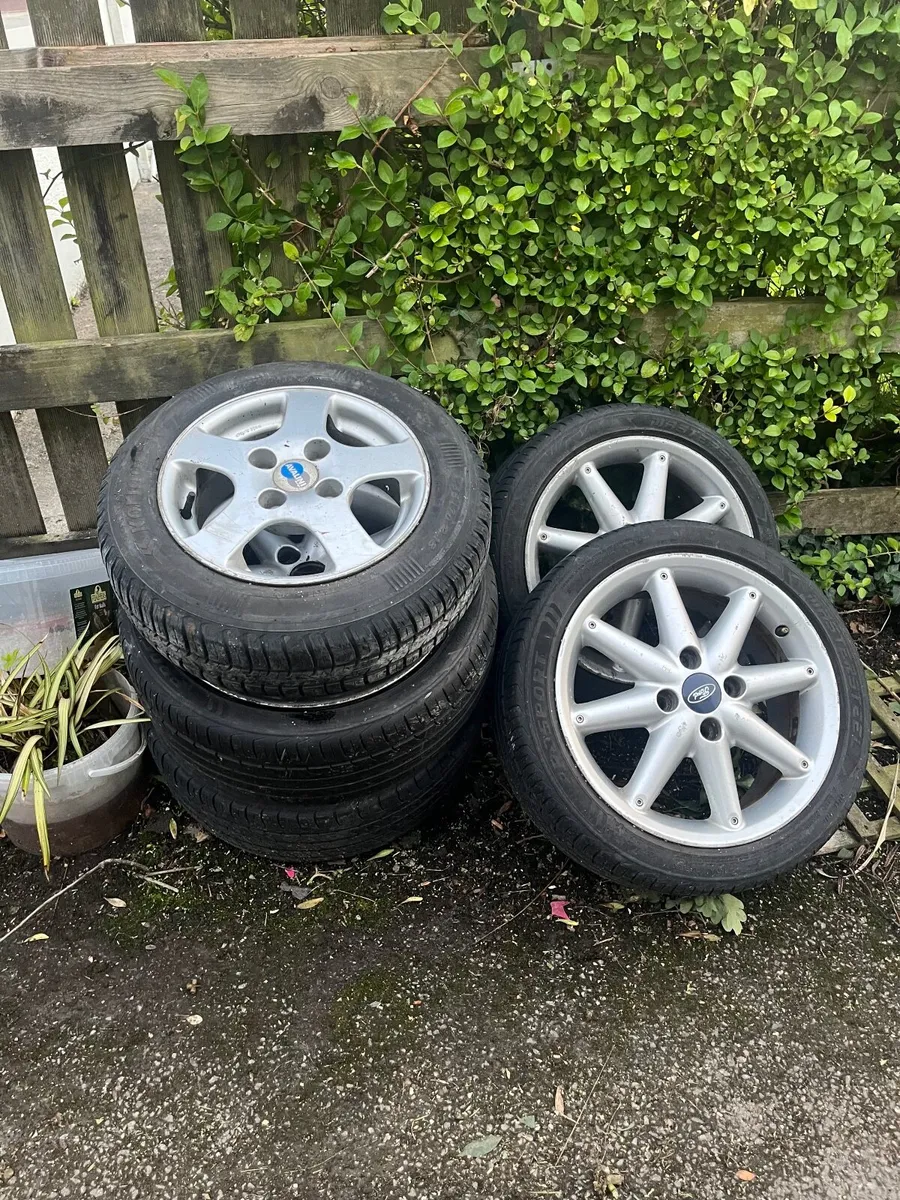 Alloy wheels with tires - Image 1