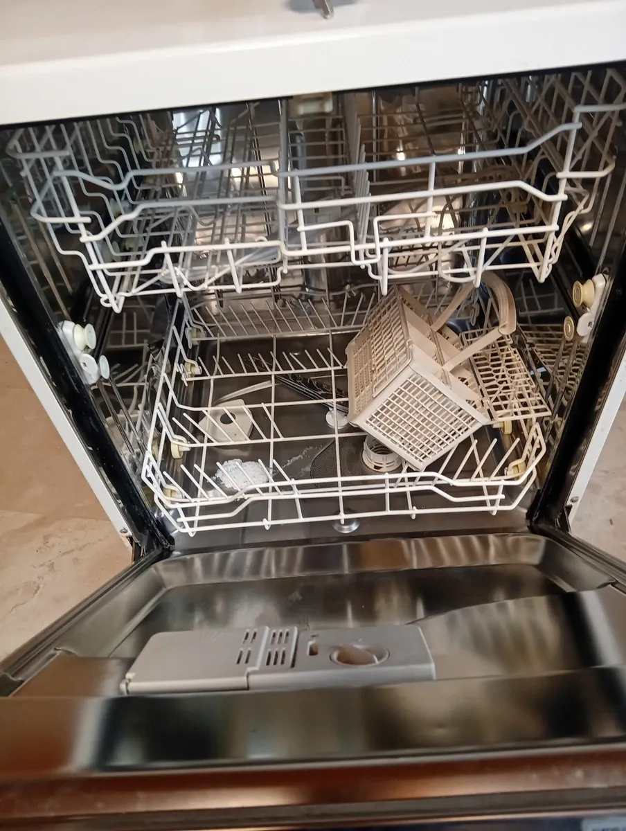 Dishwasher and single bed with mattress. - Image 3