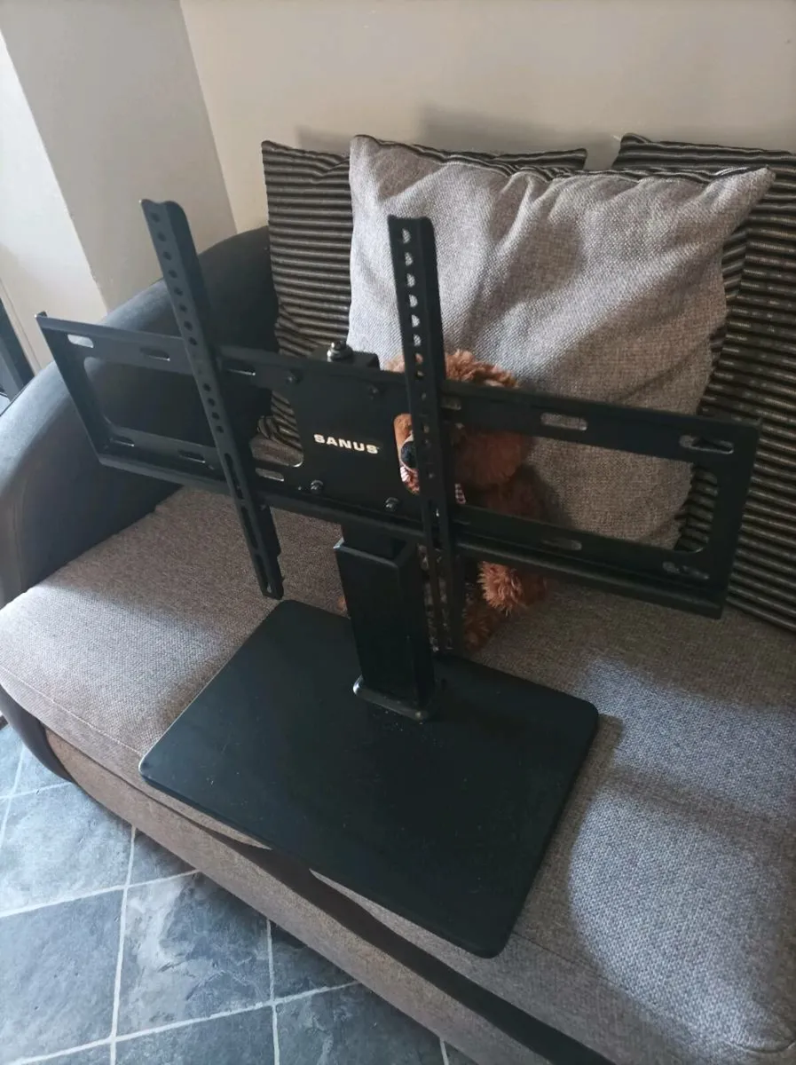 Sanus table-top TV bracket holder holds up to 60"