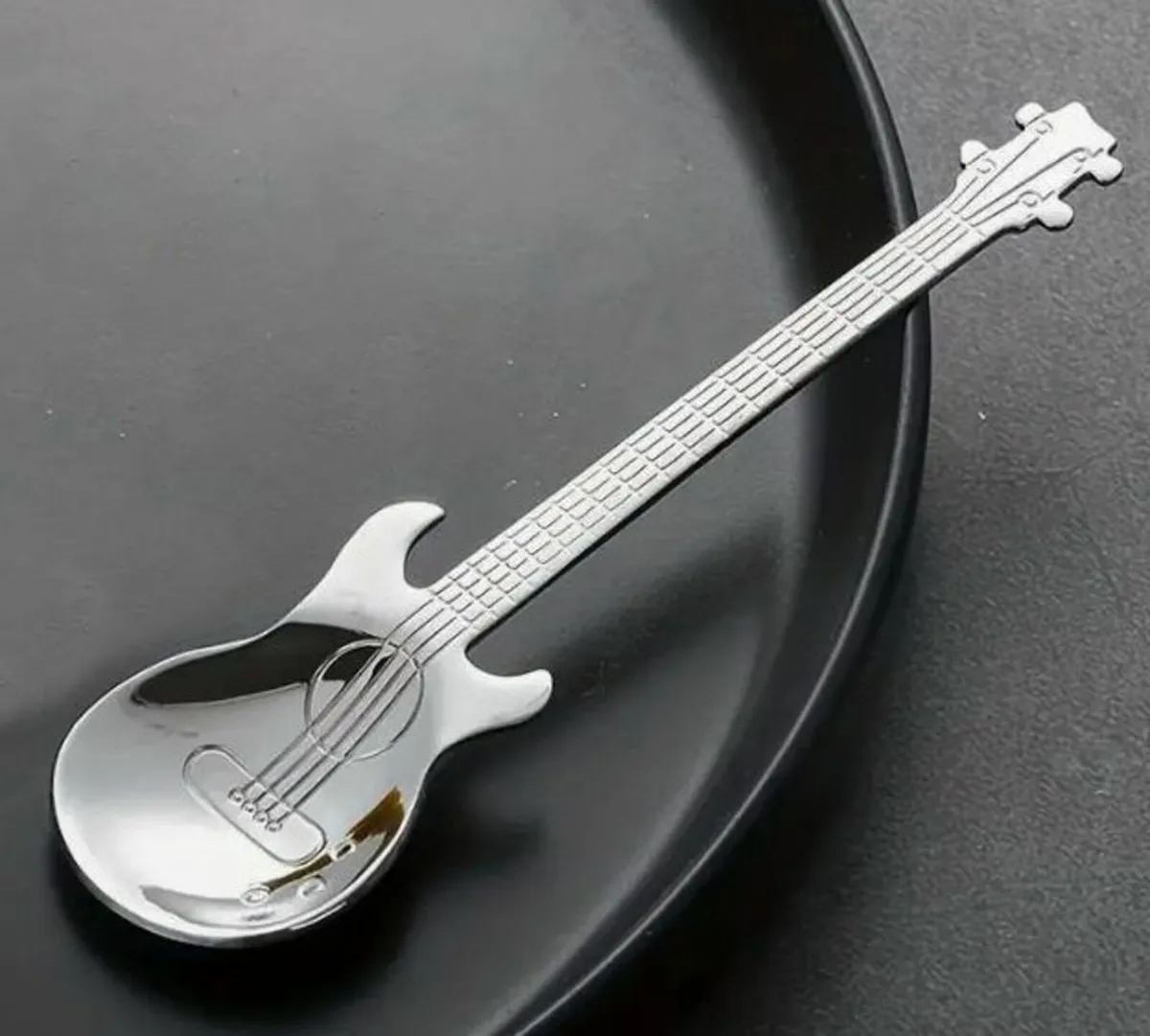 6 STAINLESS GUITAR SPOONS (BRAND NEW). - Image 1