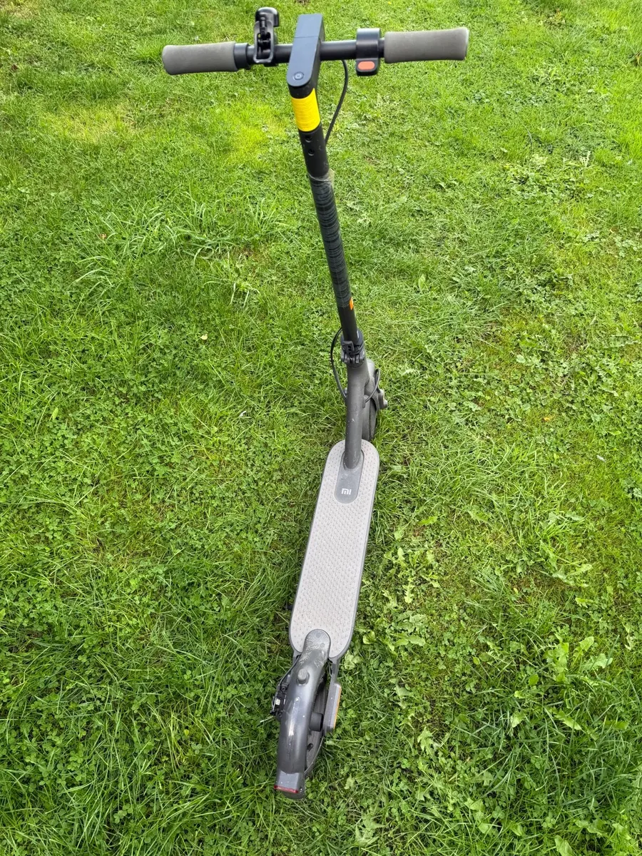 Electric Scooter + Charger - Image 1