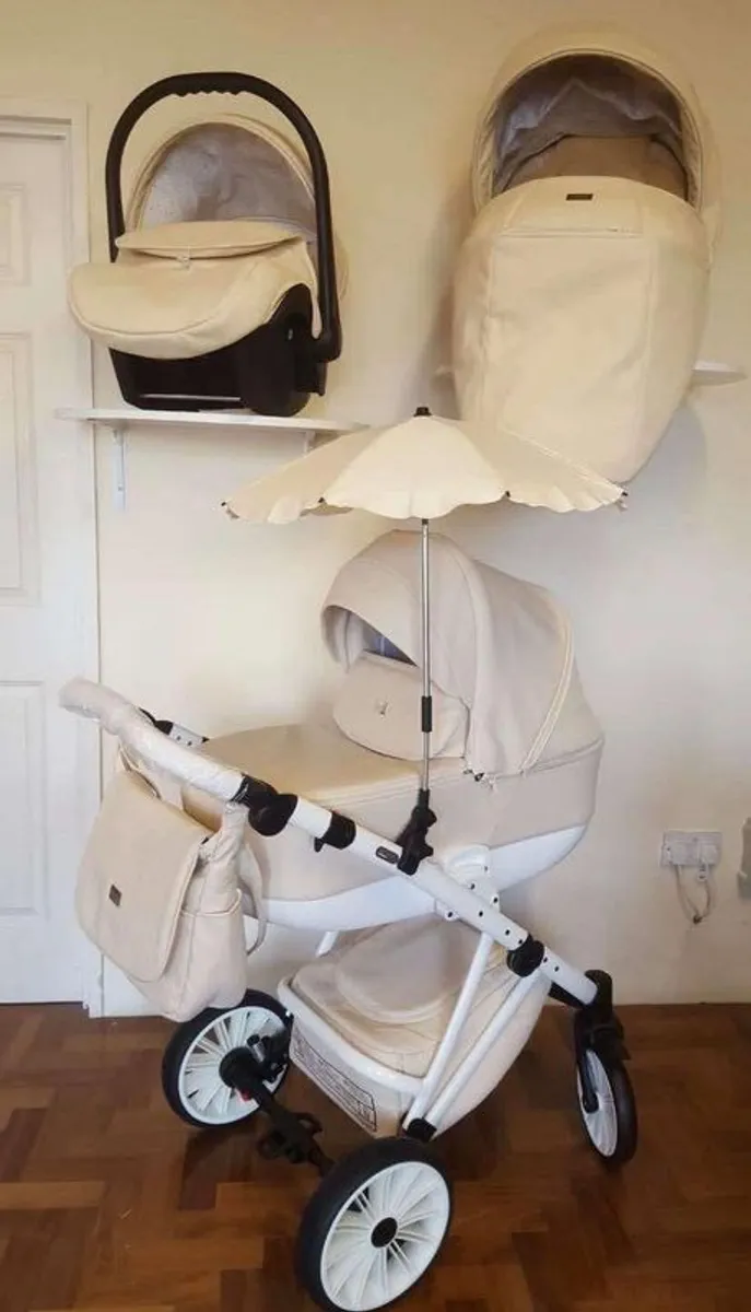 Cream leatherd 3 in 1 buggy
